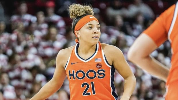 Kymora Johnson handles the ball during the Virginia women's basketball game at NC State.